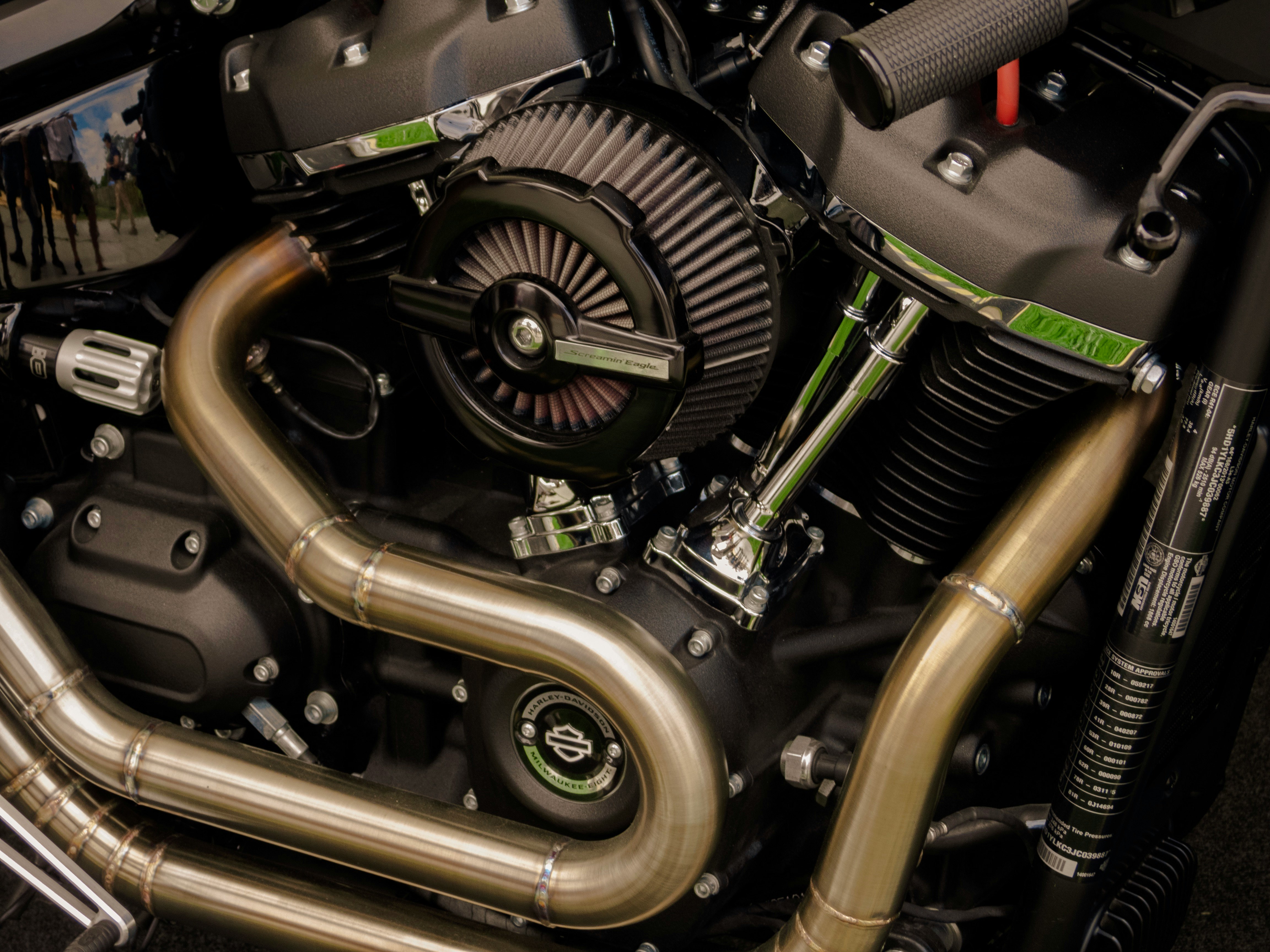 closeup photography of motorcycle engine